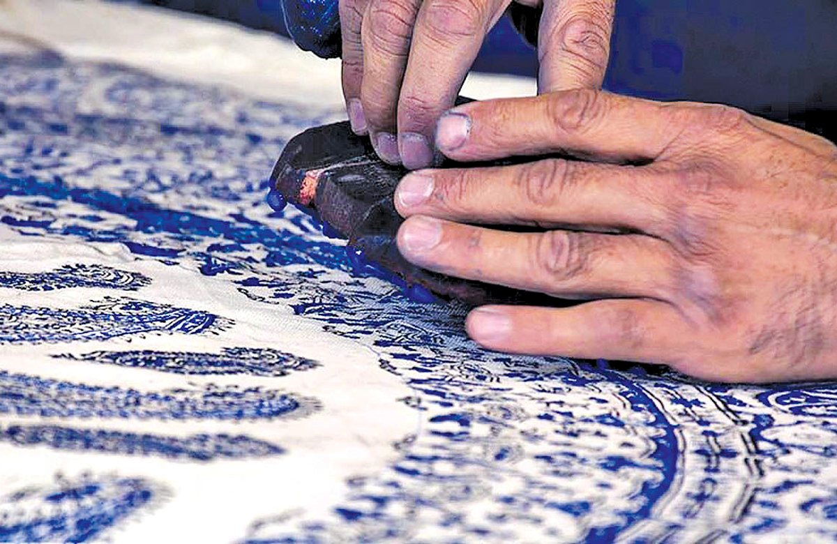 Editorial illustration for Kashan Carpet Weaving Traditions